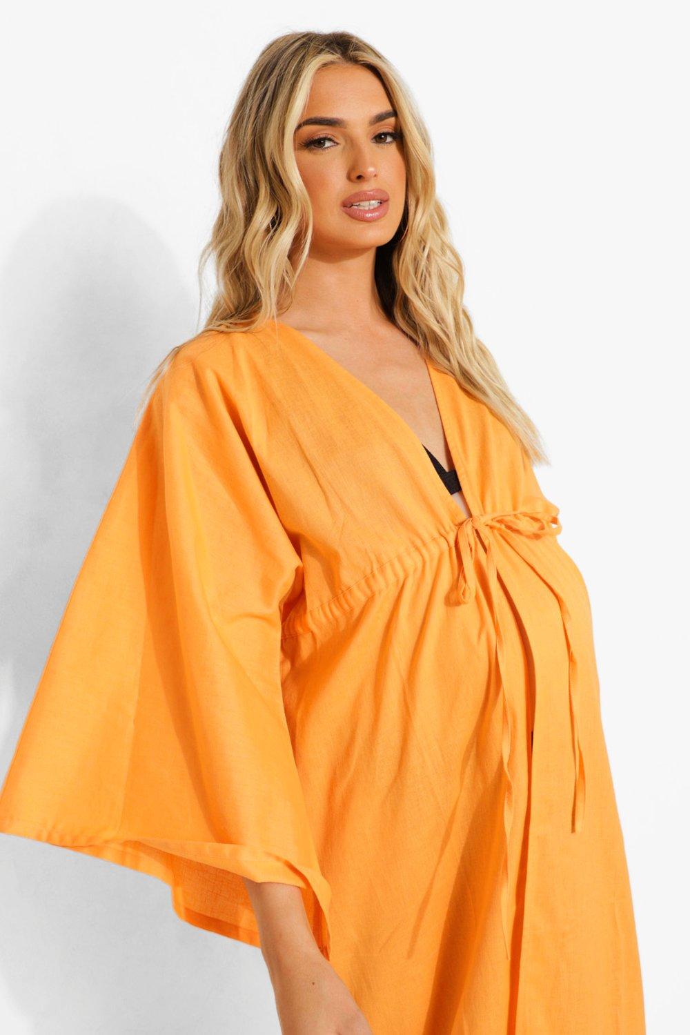 https://media.boohoo.com/i/boohoo/bzz00661_coral_xl_3/female-coral-maternity-tie-front-beach-cover-up
