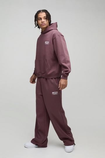 Oversized Boxy Hoodie En Wide Leg Trainingspak Met Mouwstrikjes chocolate