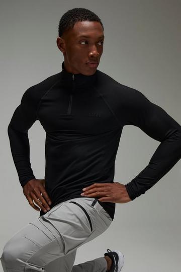 Man Active Waffle Texture Muscle Fit 1/4 Zip black