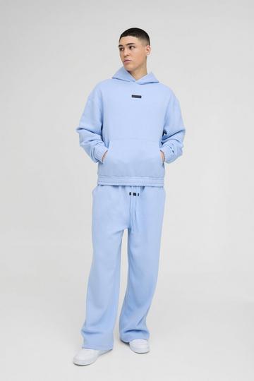 Oversized Boxy Drop Crotch Hooded Tracksuit With Rubber Badge light blue