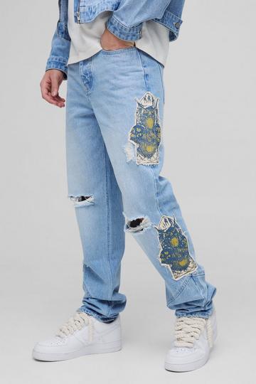 Slim Stacked All Over Rip & Repair Contrast Stitch Jeans light blue