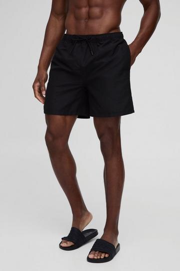 Black Mid Length Swim Short in Black