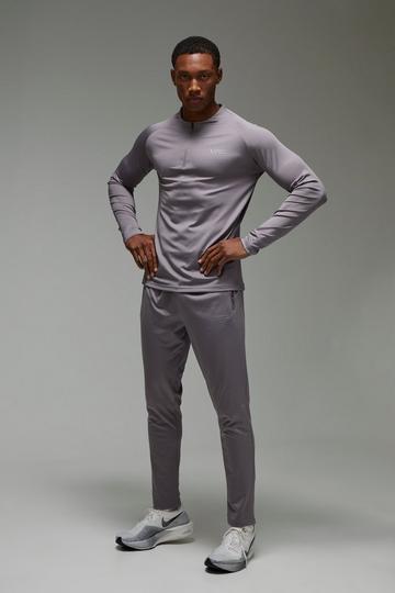 Man Active Skinny Crew Neck 1/4 Zip Tracksuit grey