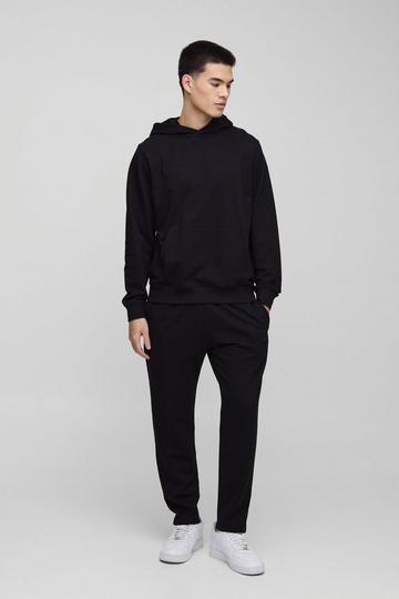 MENS. Basic Dunne Overhead Hoodie En Baggy Toelopende Joggingbroek Set black