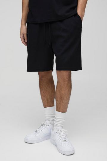 Relaxed Man Embroidered Waffle Shorts black