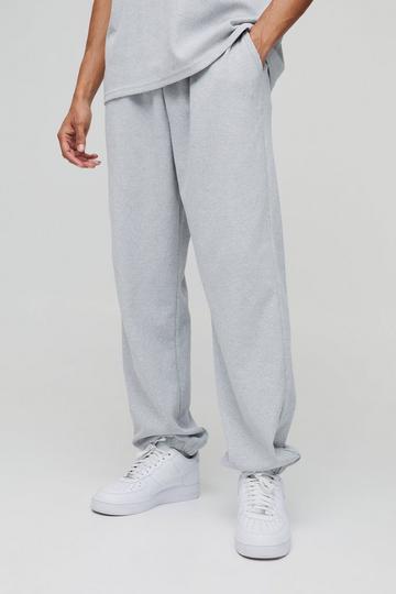 Oversized Man Embroidered Waffle Cuffed Joggers grey