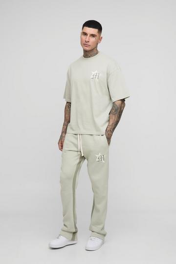 Tall Oversized Boxy Graffiti T-Shirt En Slim Fit Joggingbroek Trainingspak Met Print stone