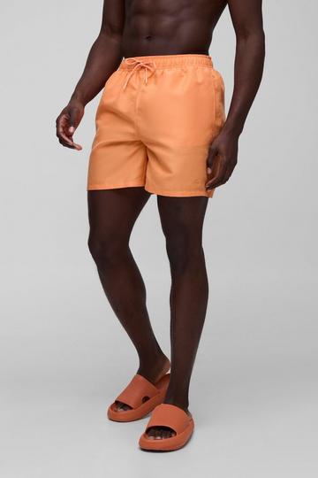 Orange Short de bain mi-long à broderie