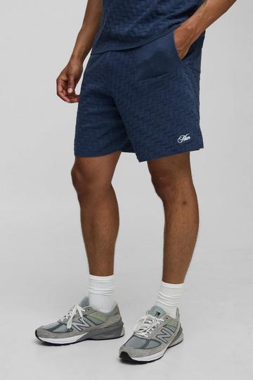 MAN Relaxed Cross Hatch Embroidered Knitted Shorts navy