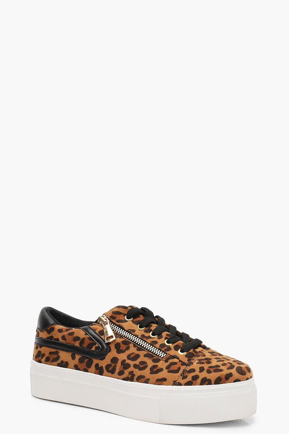scarpe sportive maculate