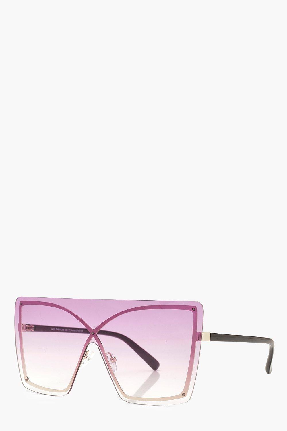 Lunettes de soleil oversize dessus plat factice