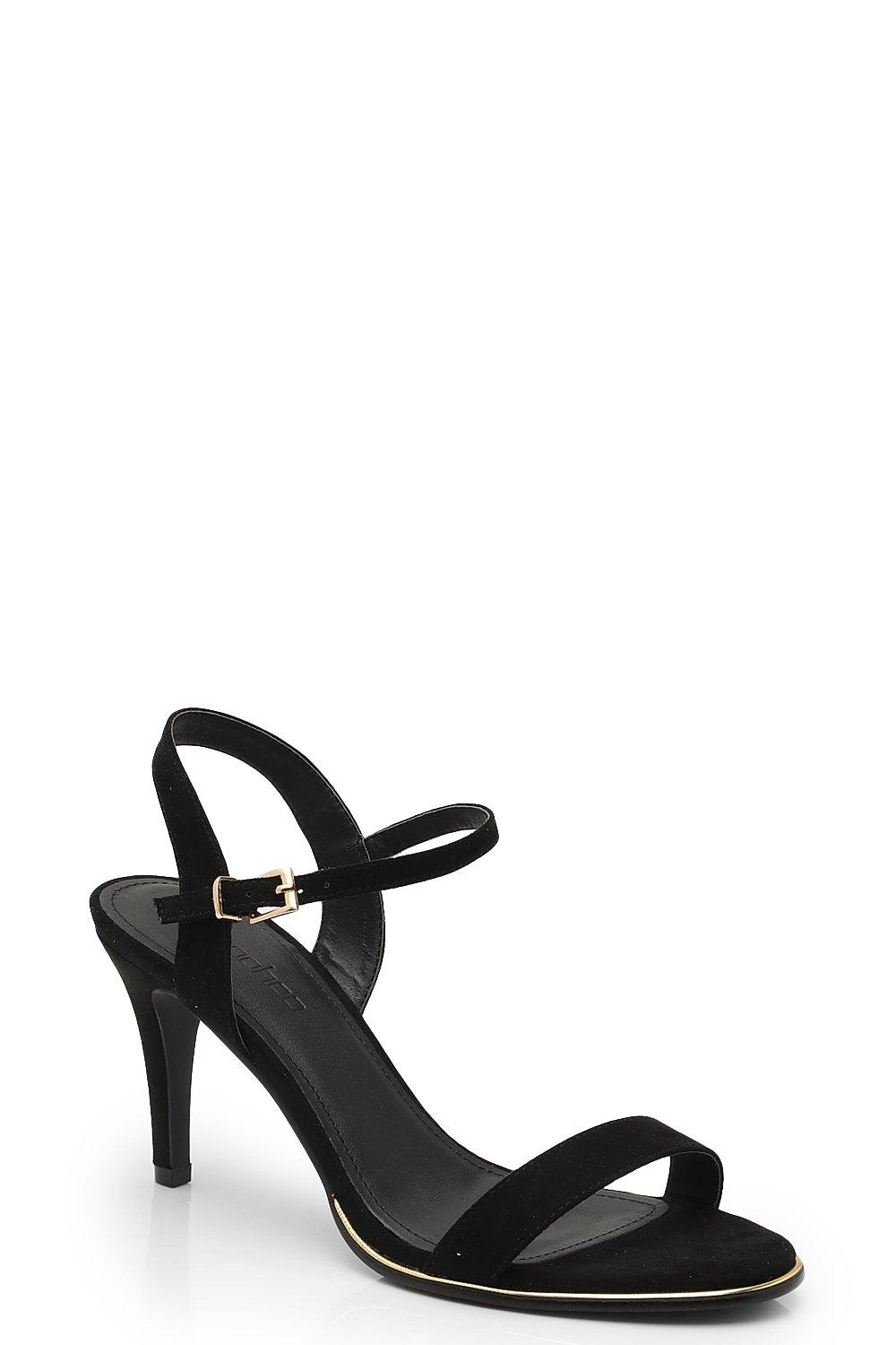 black shoes with gold trim