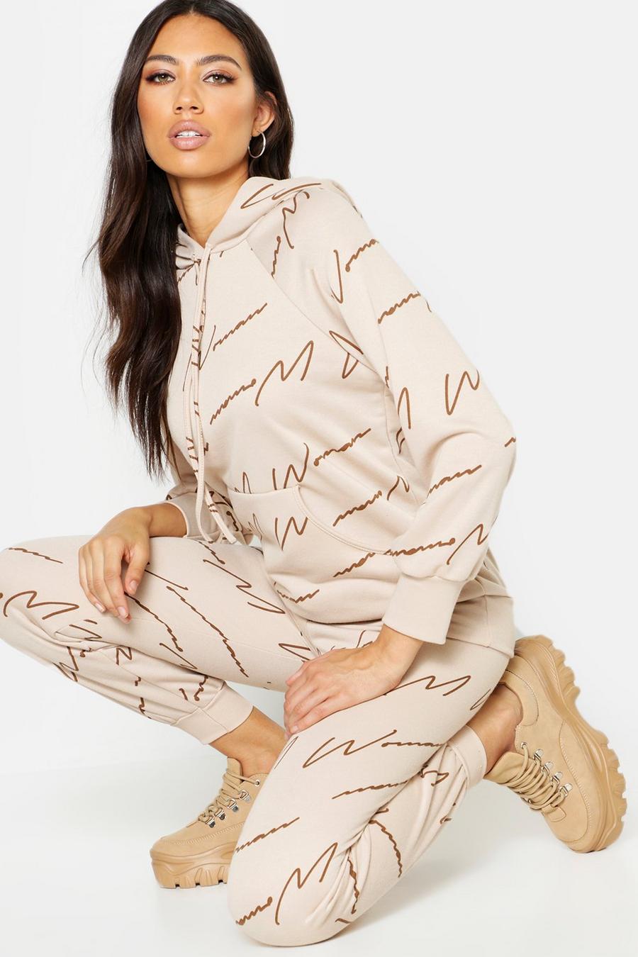 Beige Woman Script All Over Print Joggers image number 1