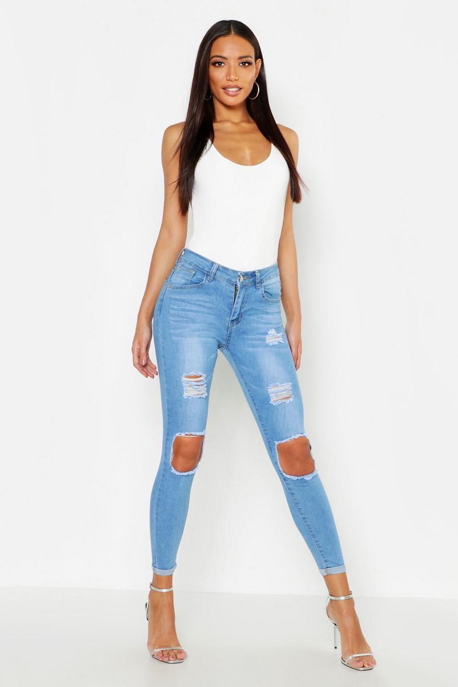 Light blue High Waisted Distressed Skinny Jeans image number 1