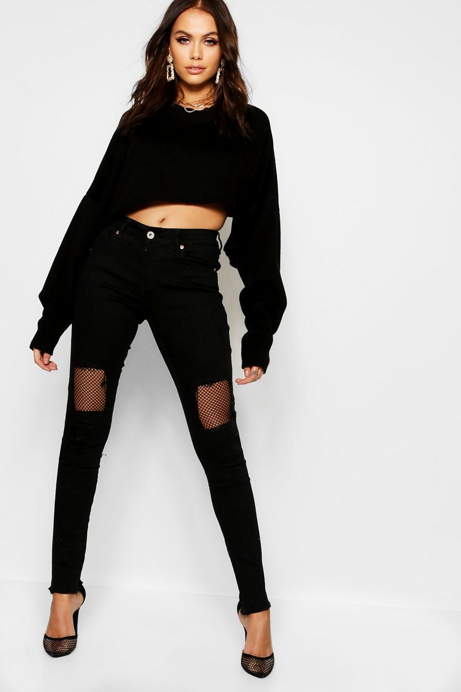 Black Mid Rise Fishnet Detail Ripped Skinny Jeans image number 1