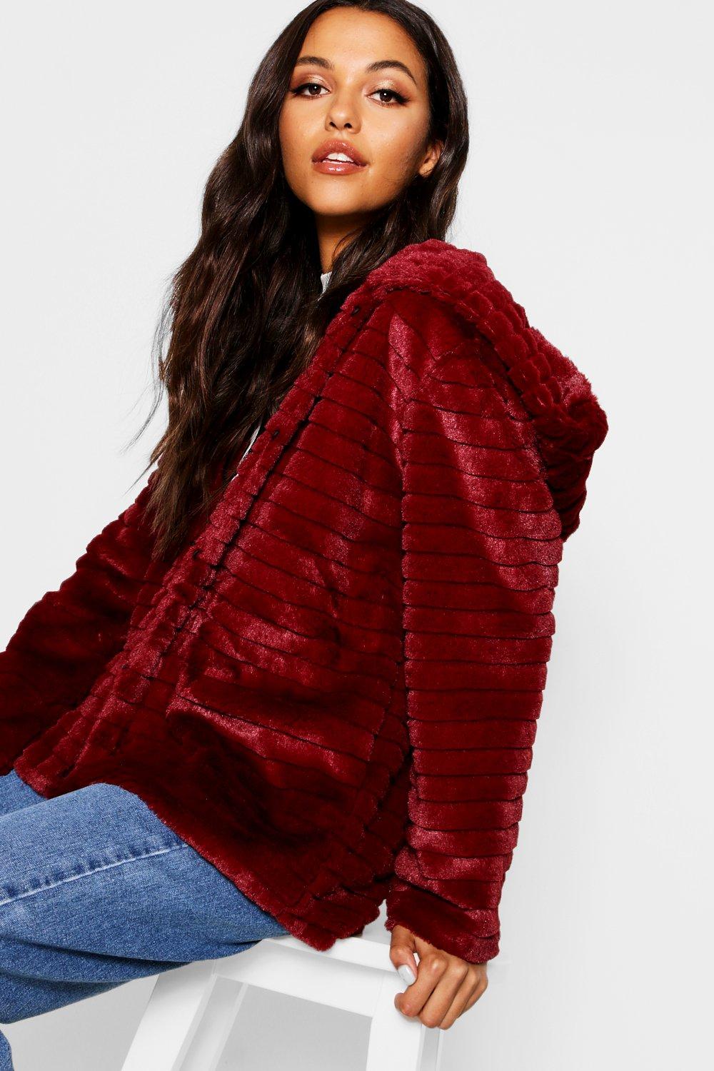 red hooded faux fur coat