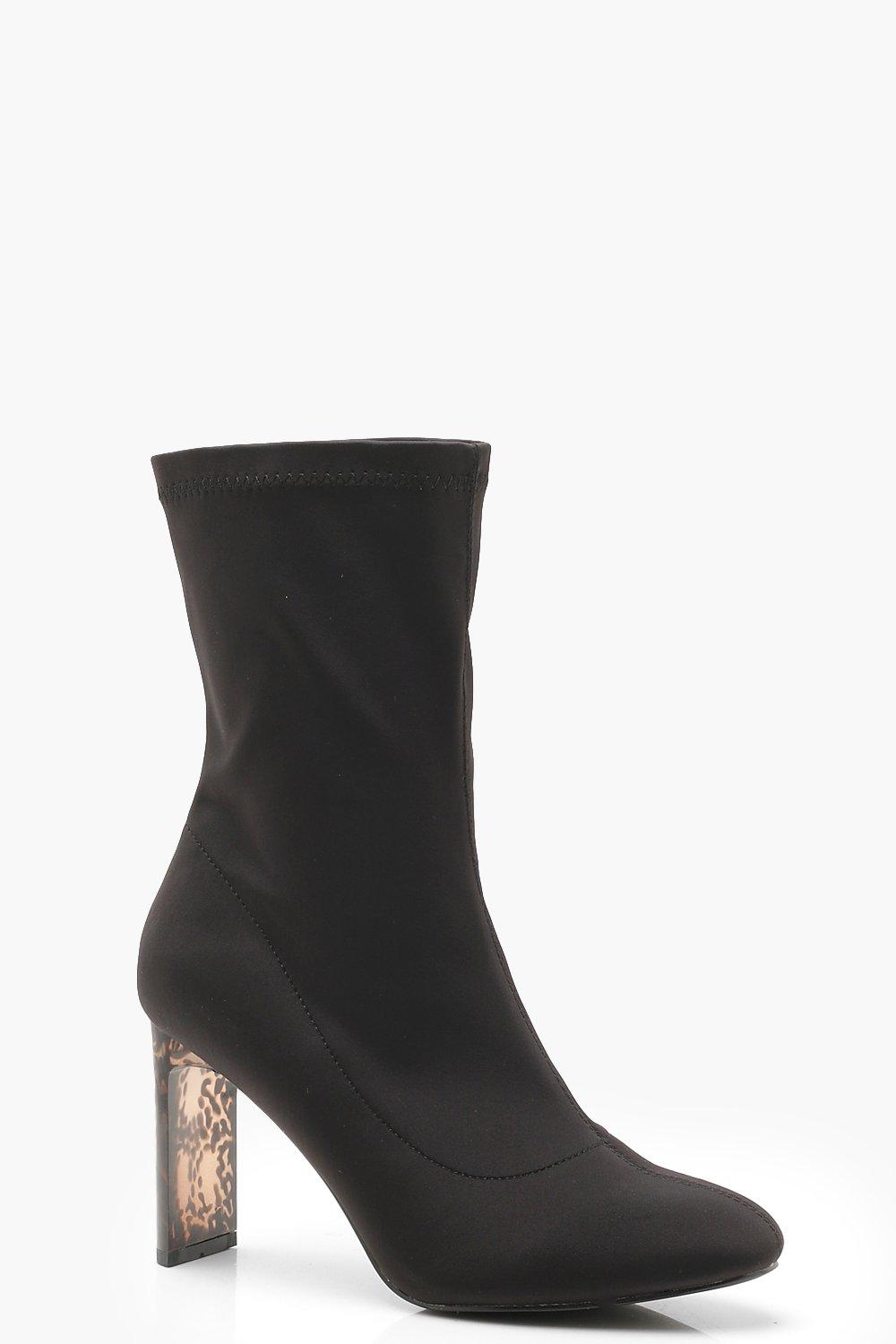 black boots with tortoise heel