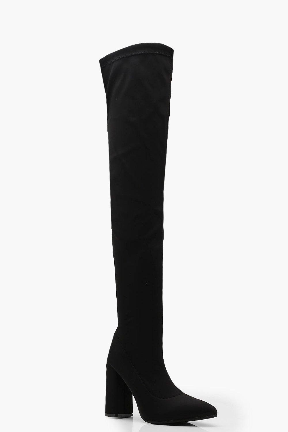 black over the knee flared heel boots