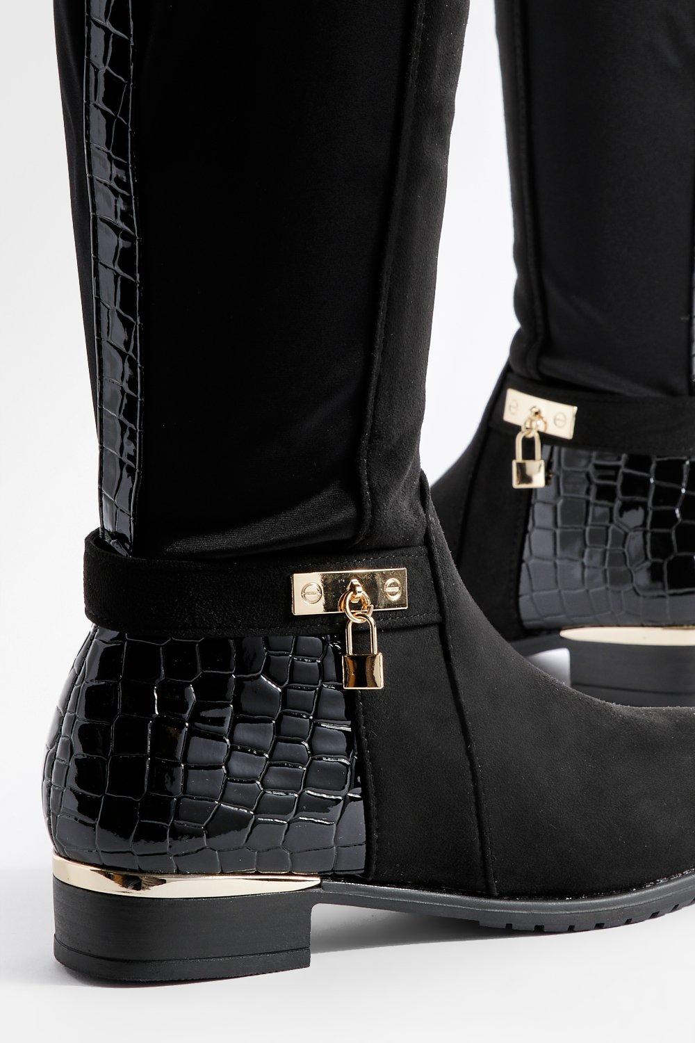 Black and clearance gold flat boots