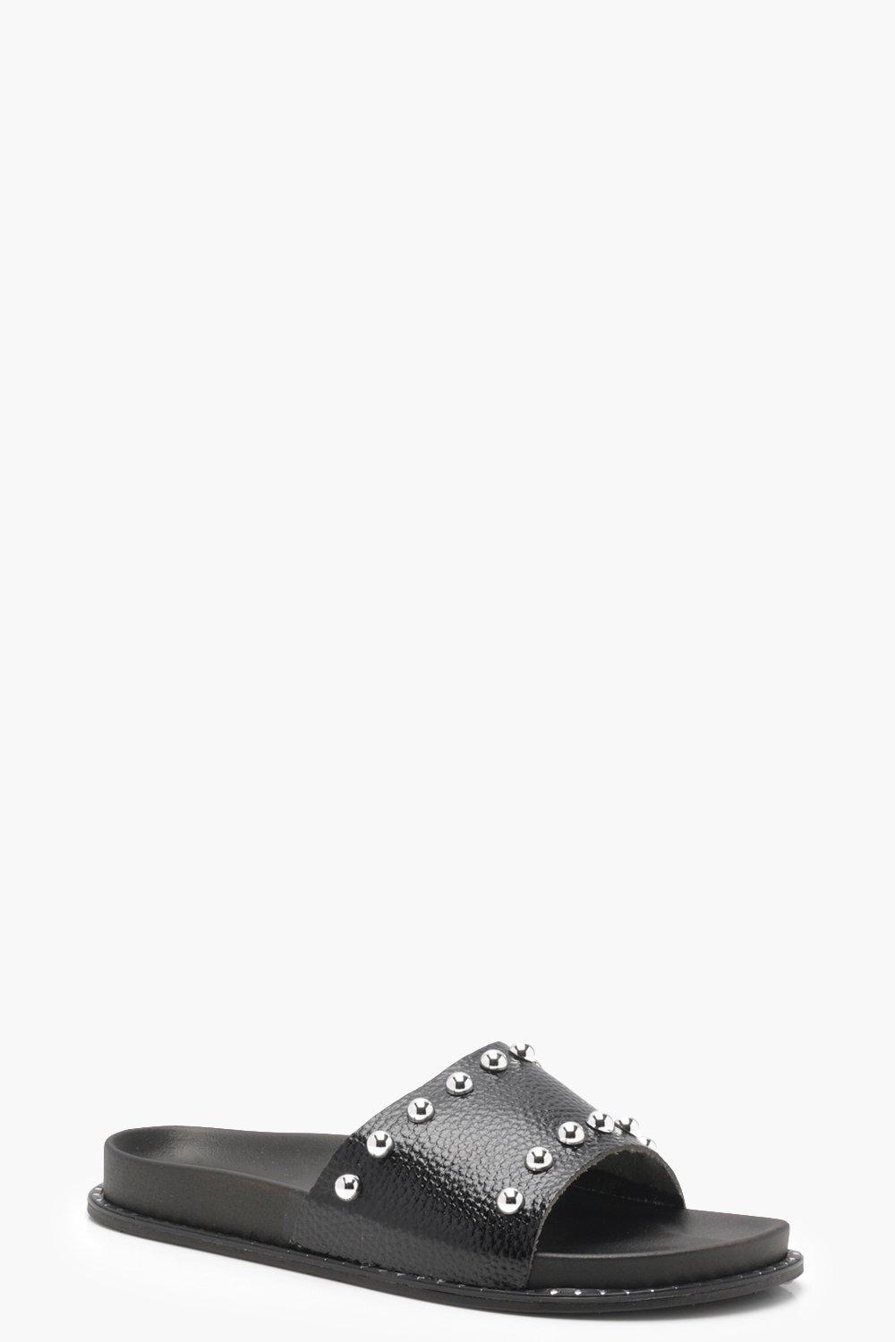 mules noires cloutées