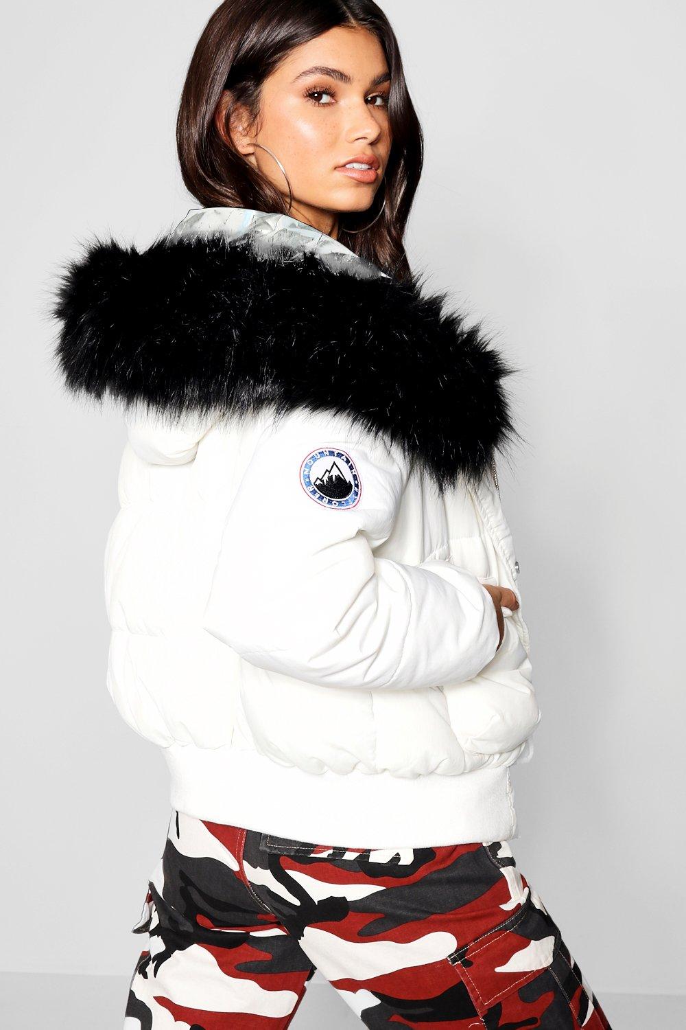 black parka with white fur hood