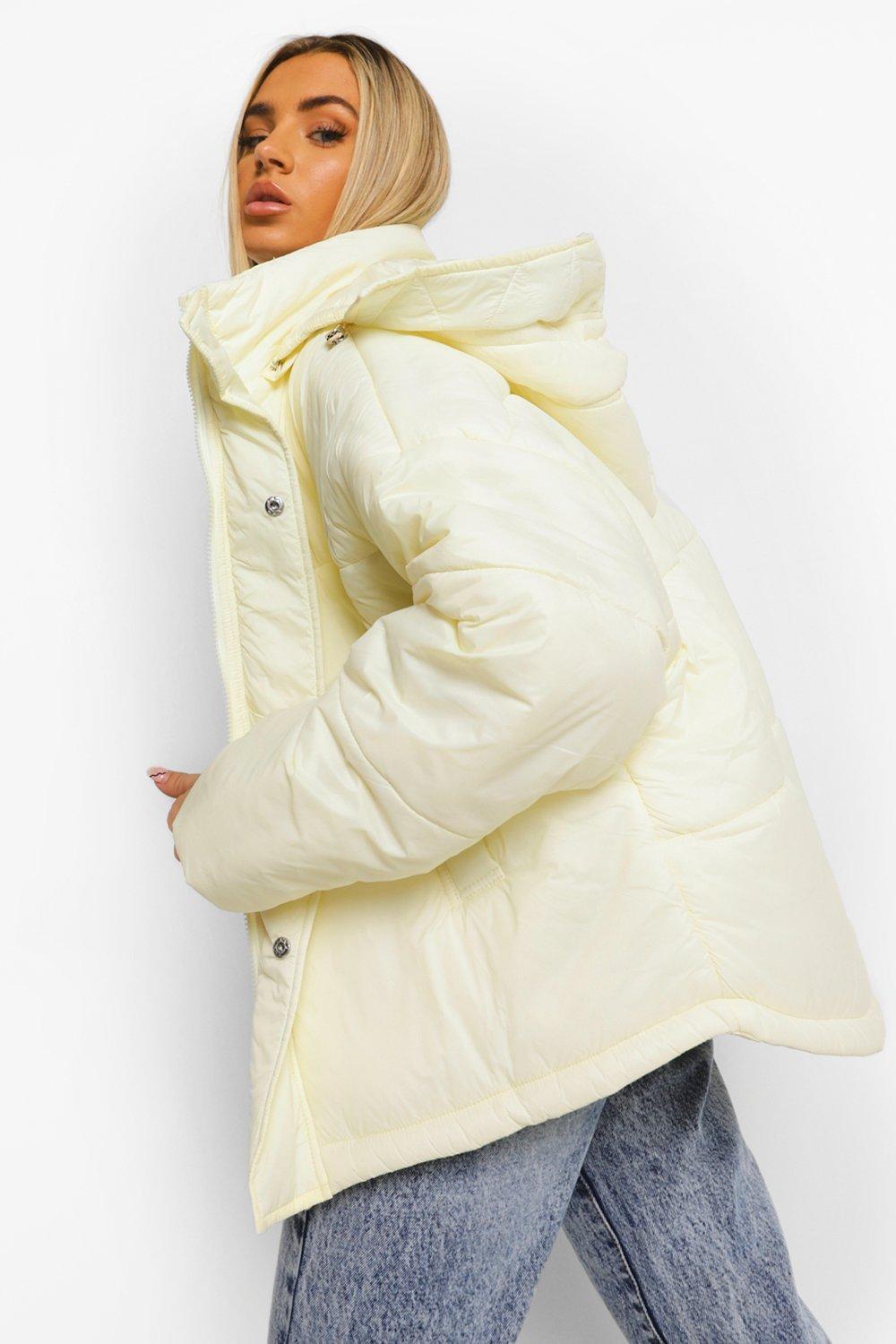 cream puffer jacket with fur hood