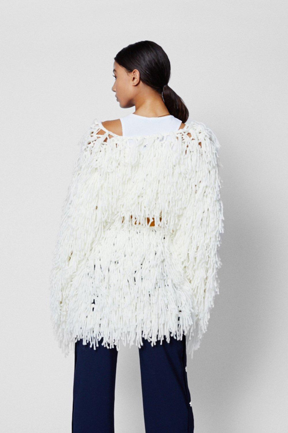 white shaggy cardigan