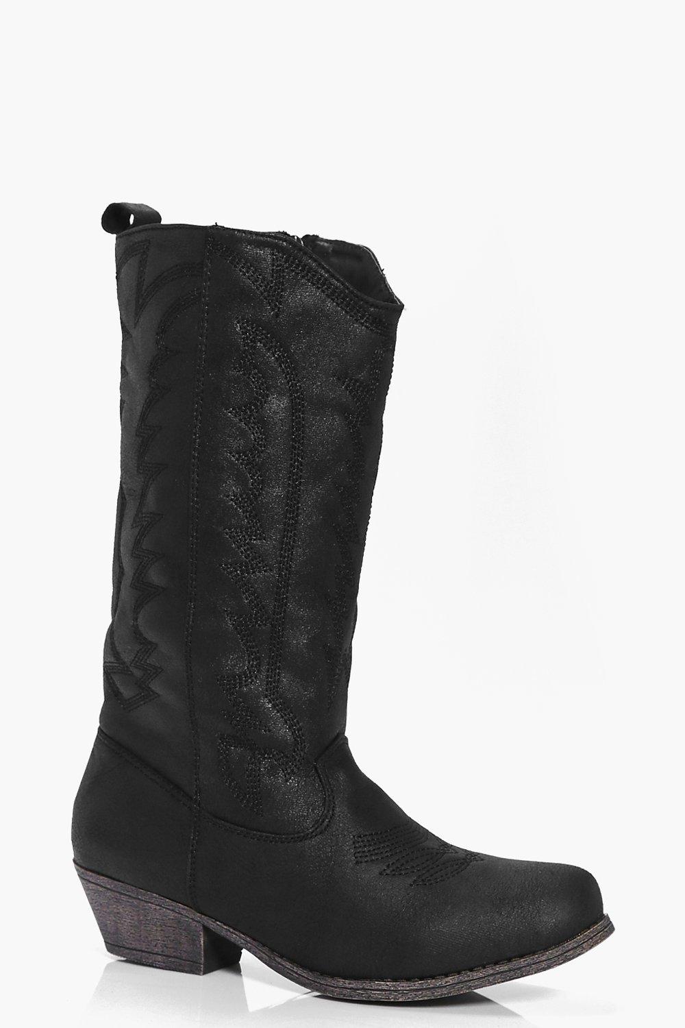 black cowboy boots with white stitching