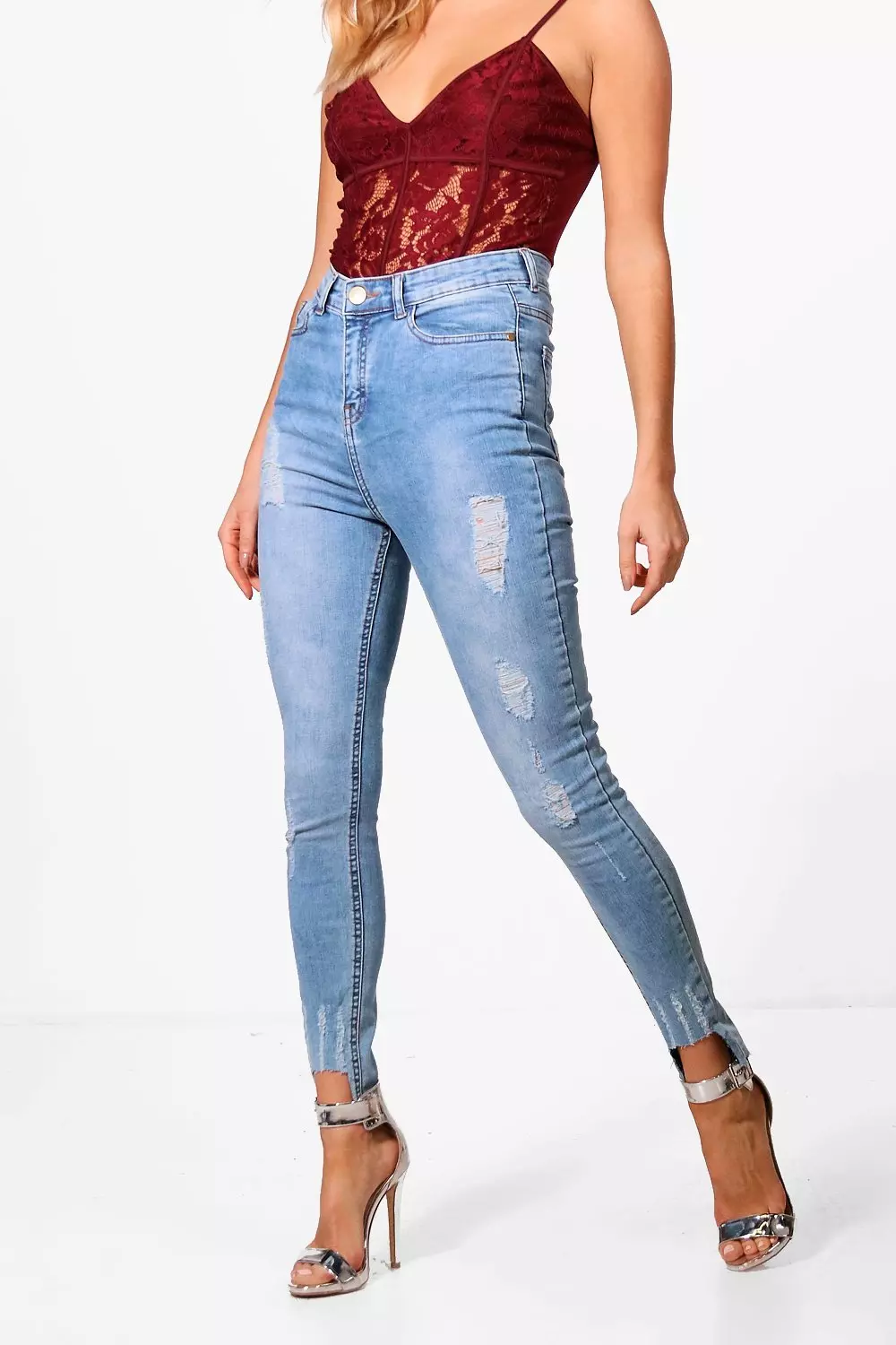 Destroyed hem hot sale skinny jeans