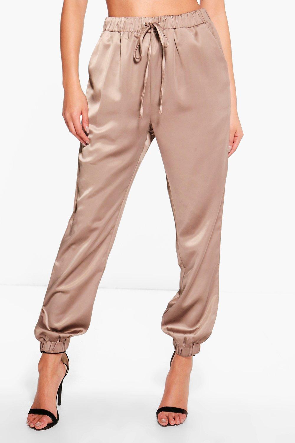 https://media.boohoo.com/i/boohoo/dzz63605_bronze_xl_3/female-bronze-willow-luxe-satin-joggers