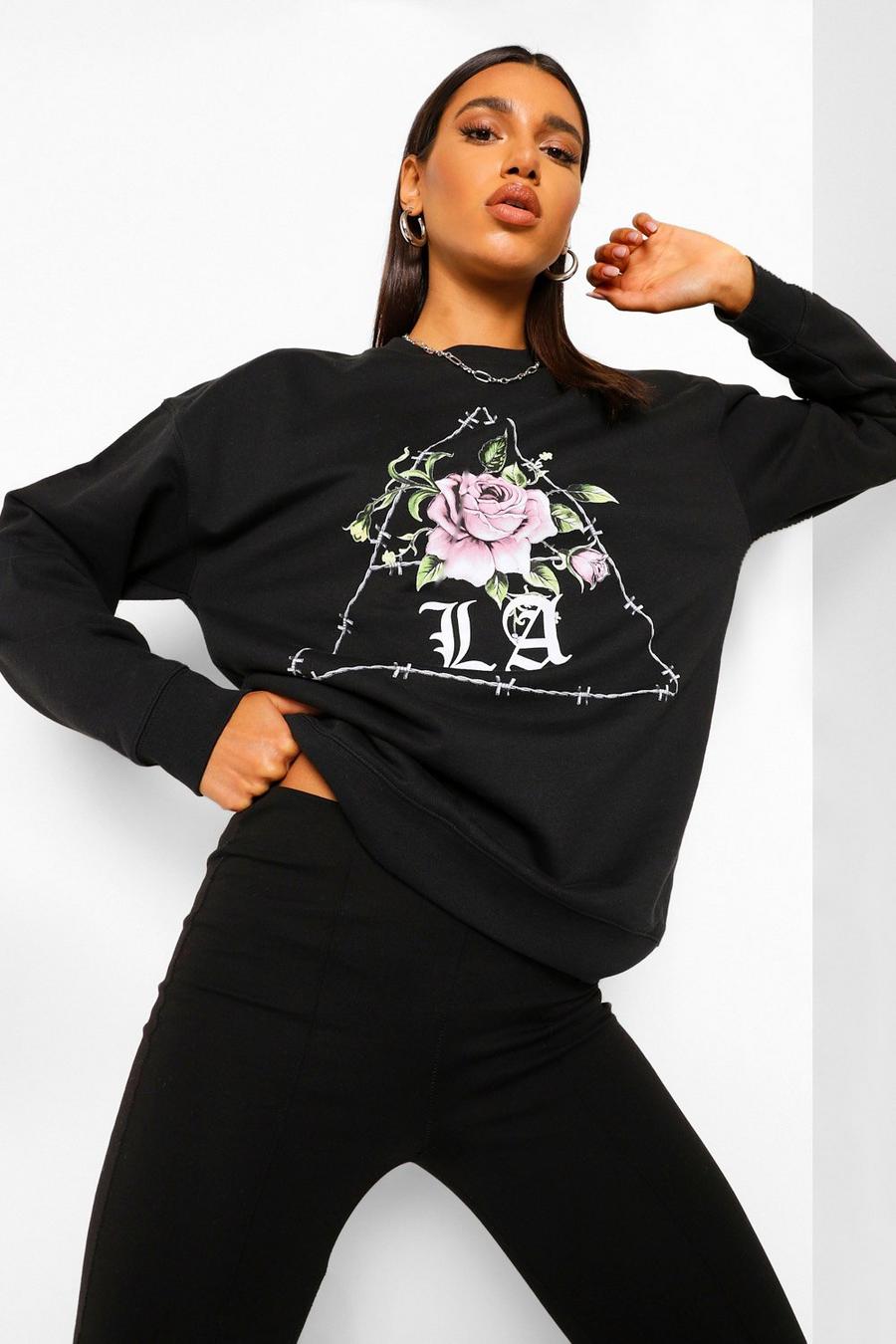 "LA" Sweatshirt i boyfriendstil med rosor och taggtråd image number 1
