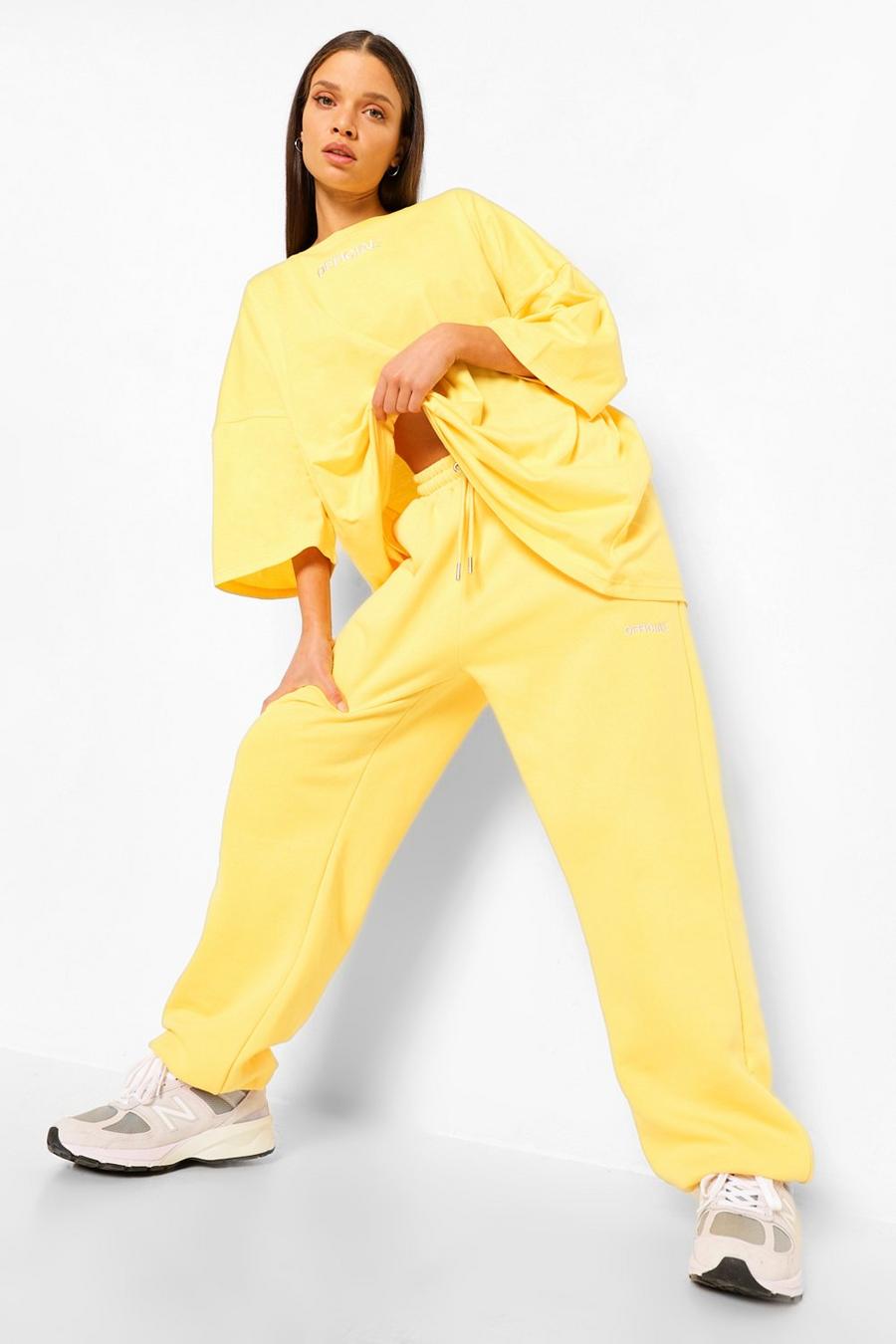 Yellow Oversize joggers med slogan image number 1
