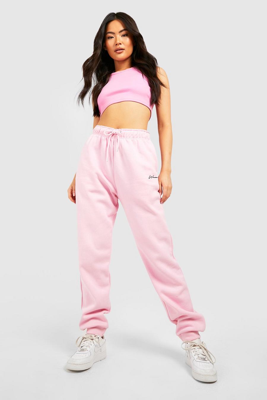 Pale pink Woman Embroidered Regular Joggers image number 1