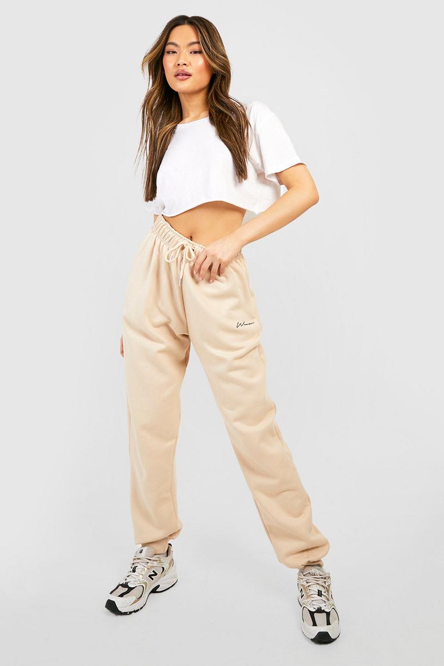 Stone Woman Embroidered Regular Track Pants image number 1