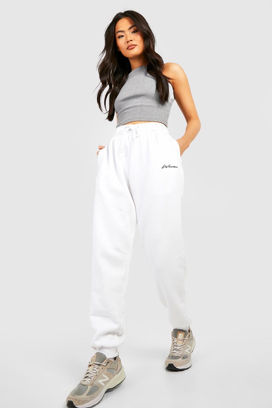 White Woman Embroidered Regular Track Pants image number 1