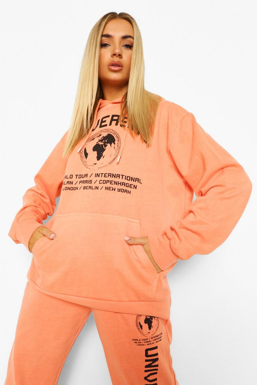 Pale orange "Universal" Oversize hoodie med stentvättad effekt och slogan image number 1