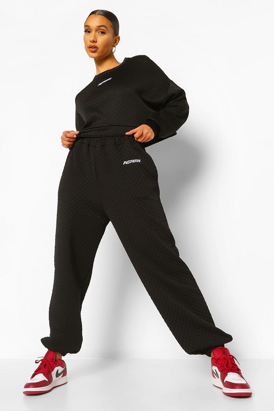 Pantalones de deporte anchos de punto waffle con bordado de mujer, Negro image number 1