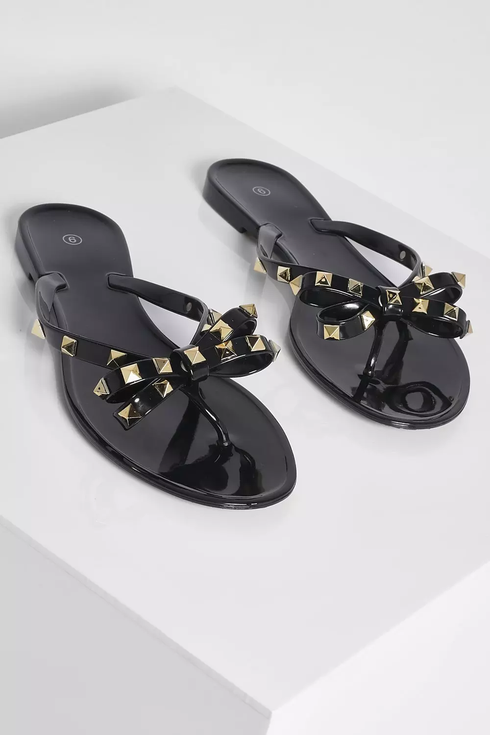 Studded bow store jelly sandals