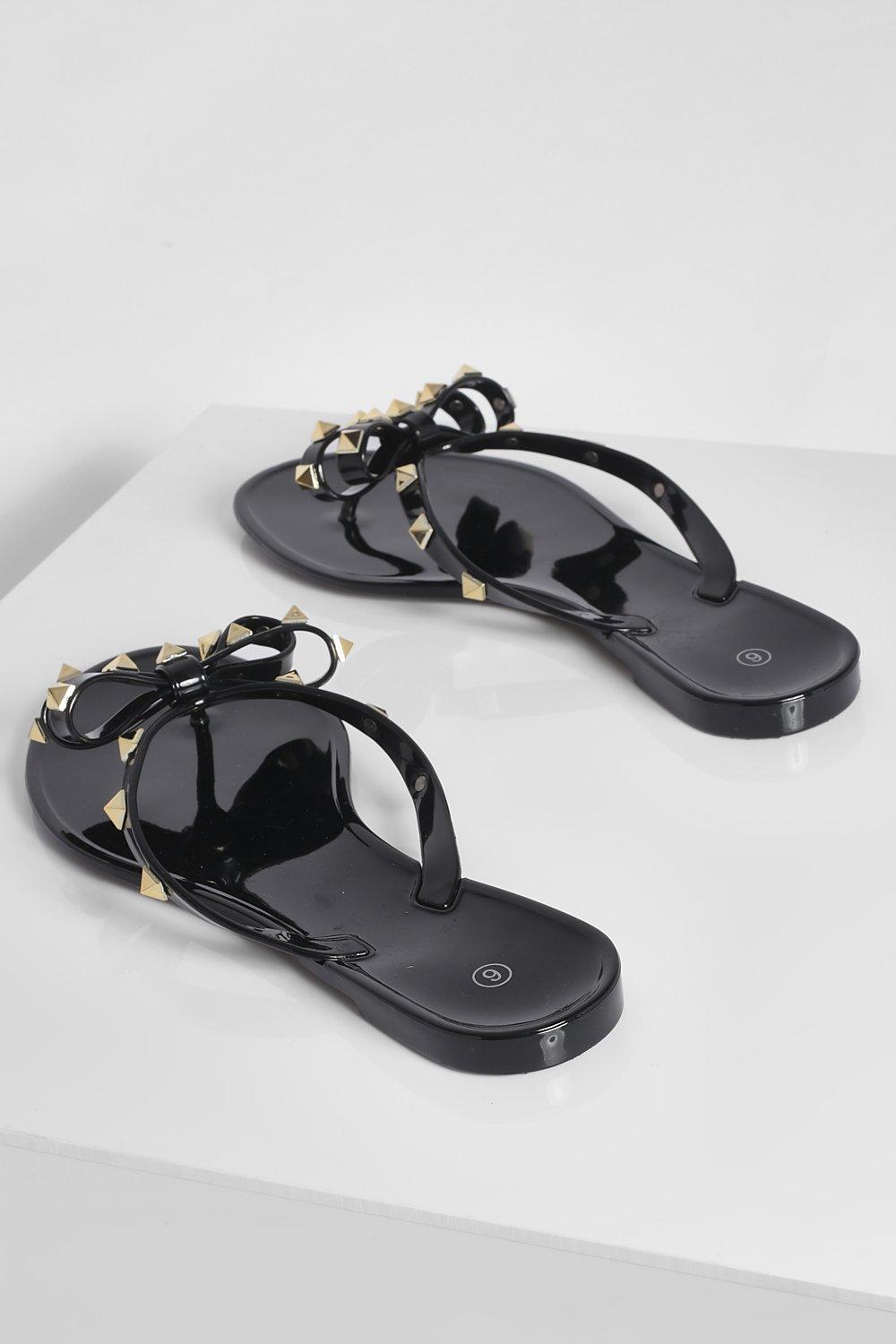 studded bow jelly flip flops