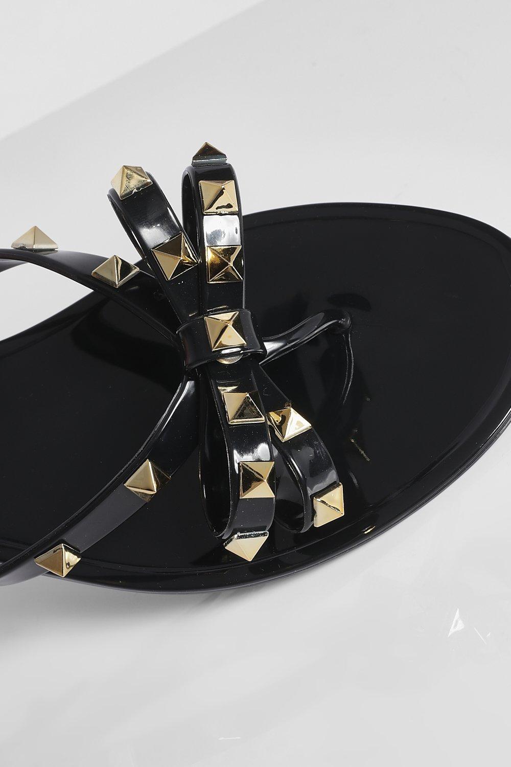 studded bow jelly flip flops