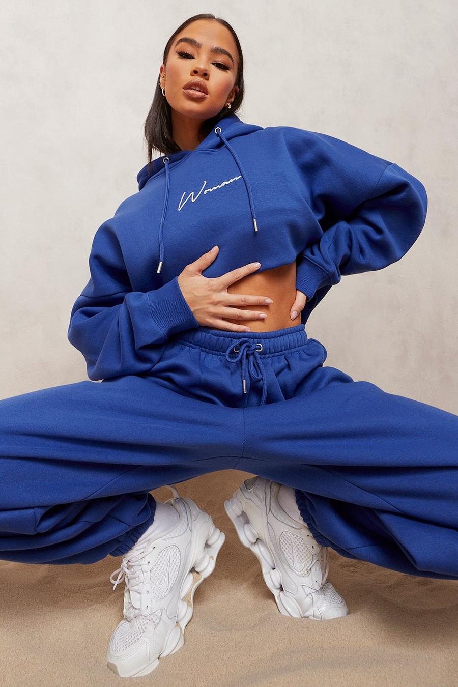 Tuta sportiva oversize con cappuccio e scritta Woman ricamata, Blu cobalto image number 1