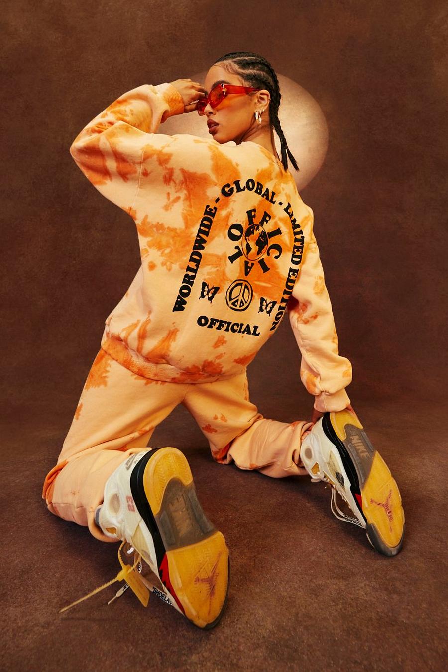 Orange "Limited Edition" Oversize sweatshirt med batikmönster image number 1