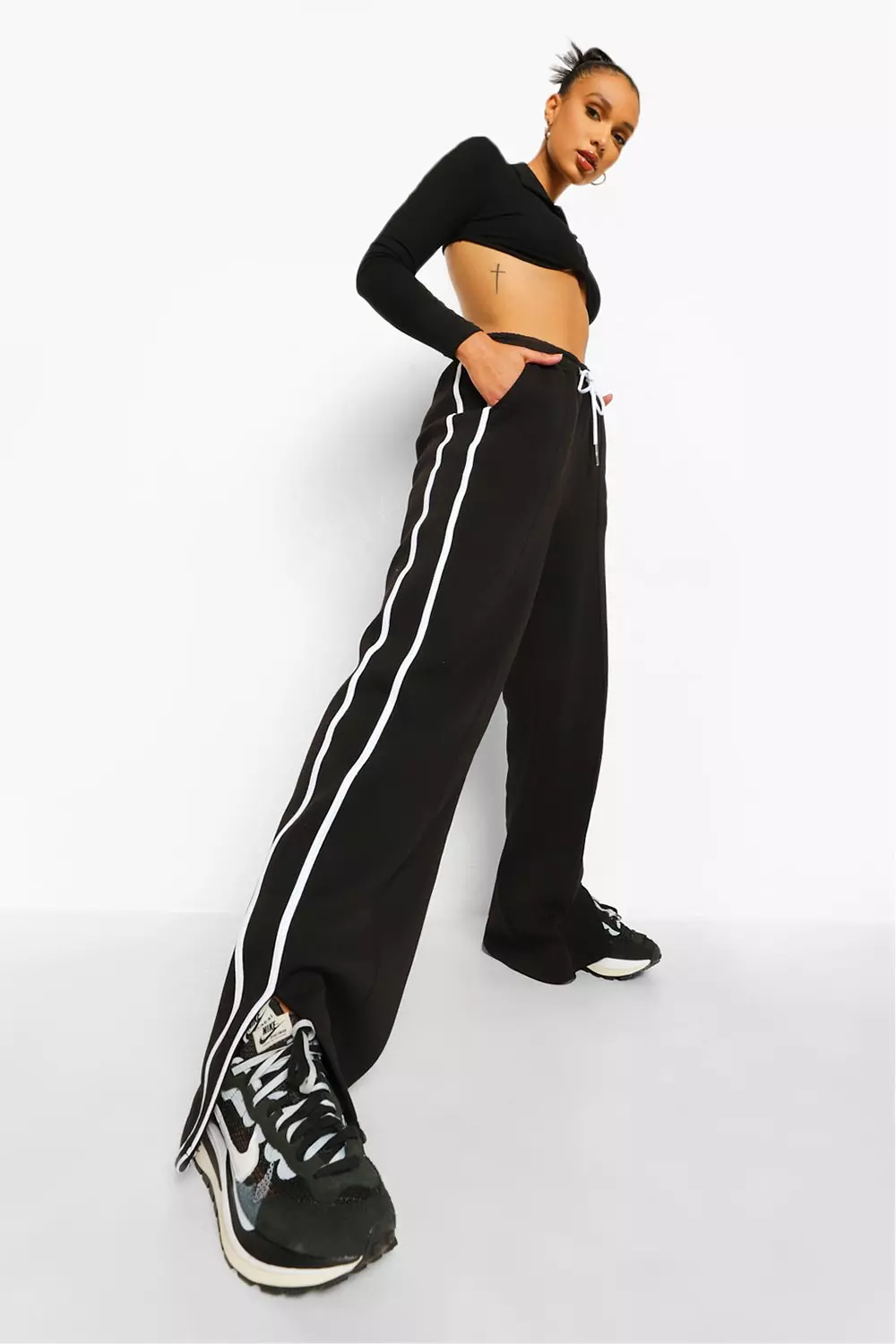 Women's track pants with side stripe hot sale