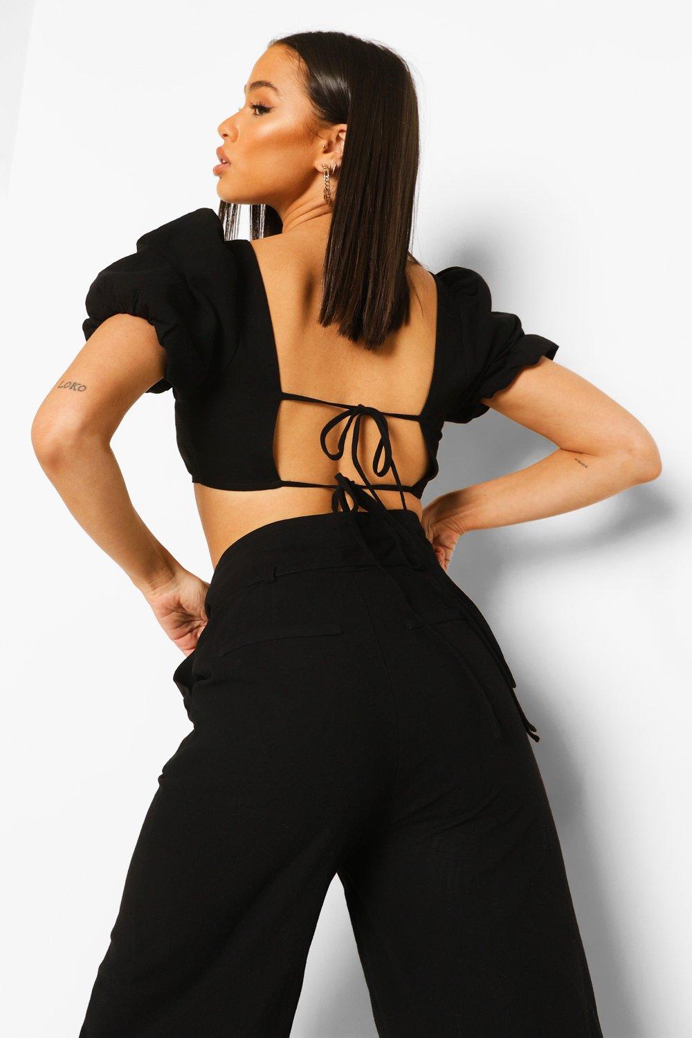 https://media.boohoo.com/i/boohoo/fzz07215_black_xl_1/female-black-linen-puff-sleeve-open-back-bralette