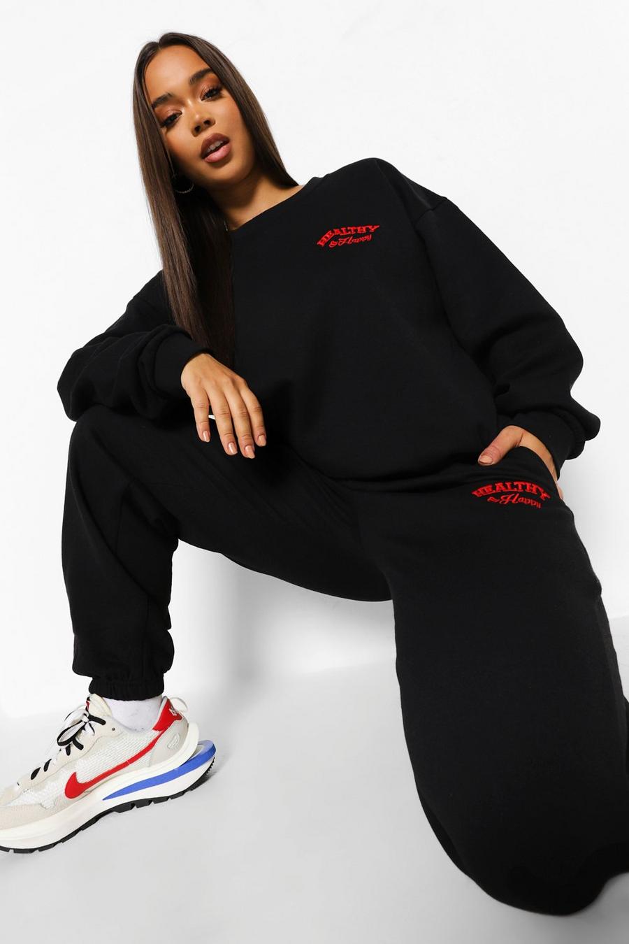 Black Healthy & Happy Embroidered Tracksuit image number 1