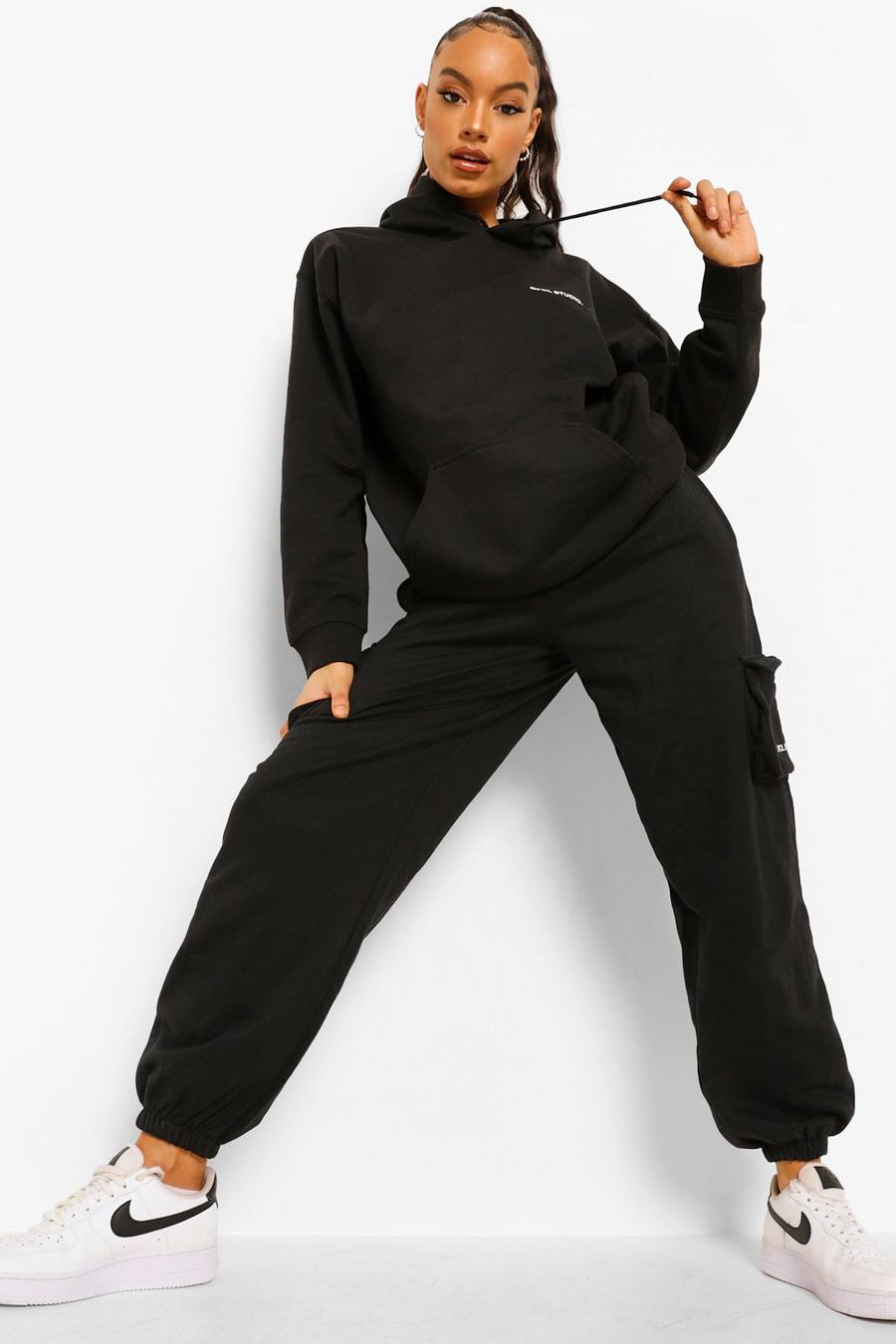 שחור חליפת טרנינג קרגו עם כיתוב Ofcl Studio image number 1