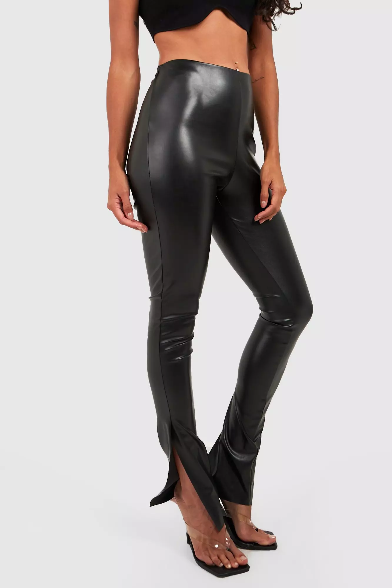 Leather-effect leggings with split hems - Woman