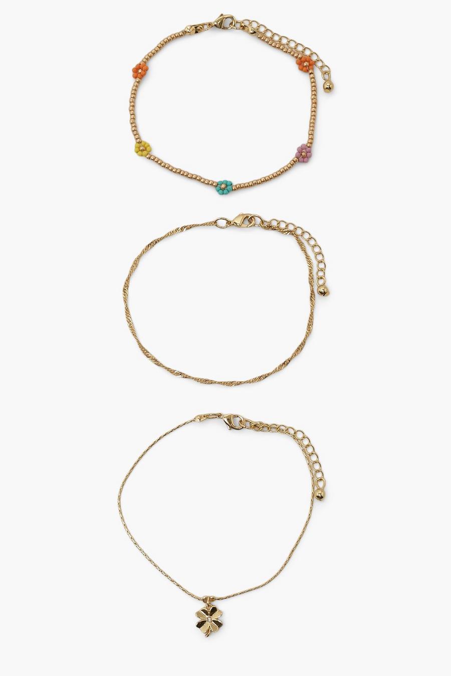Armbänder mit Perlen und Blumen , Gold image number 1
