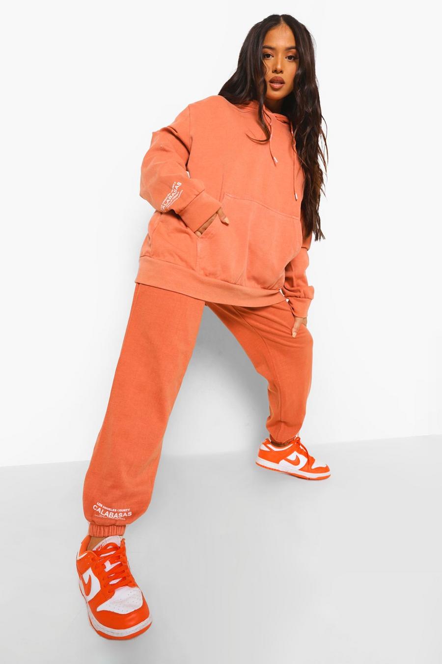 Pantalones de deporte con lavado ácido y estampado Calabasas Petite, Naranja image number 1