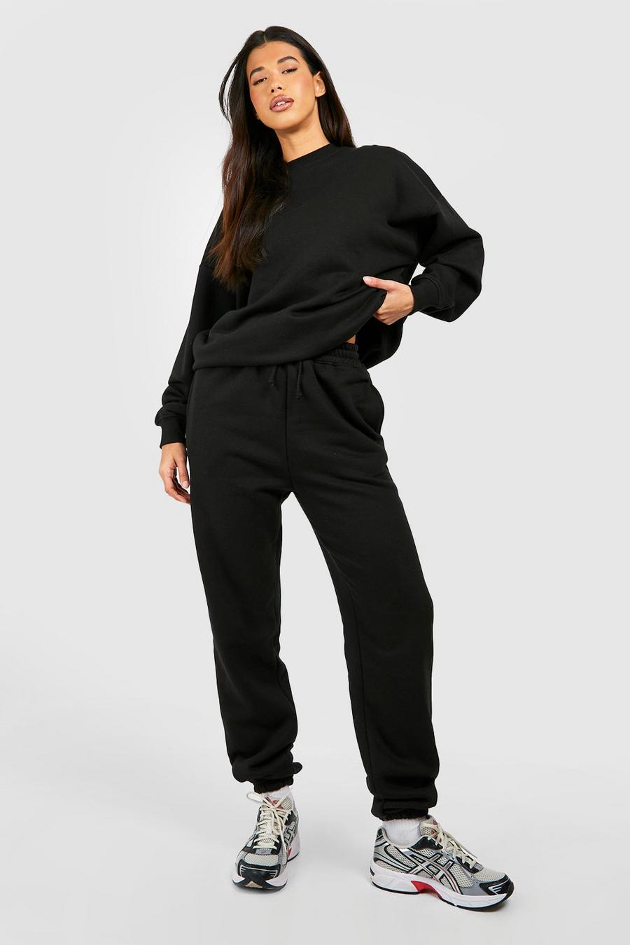 Pantalón deportivo Tall básico de materiales reciclados con botamanga, Black negro image number 1